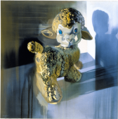 A painting of a lamb figurine.