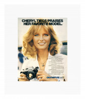 A color photo advertisement for an Olympus OM-10 camera, depicting a woman holding the camera and smiling, looking just past the viewer. The image is titled 