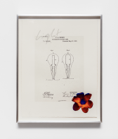 A white framed image hangs on a wall. The image shows line-drawn diagrams of lightbulbs. Above the diagrams it reads, 