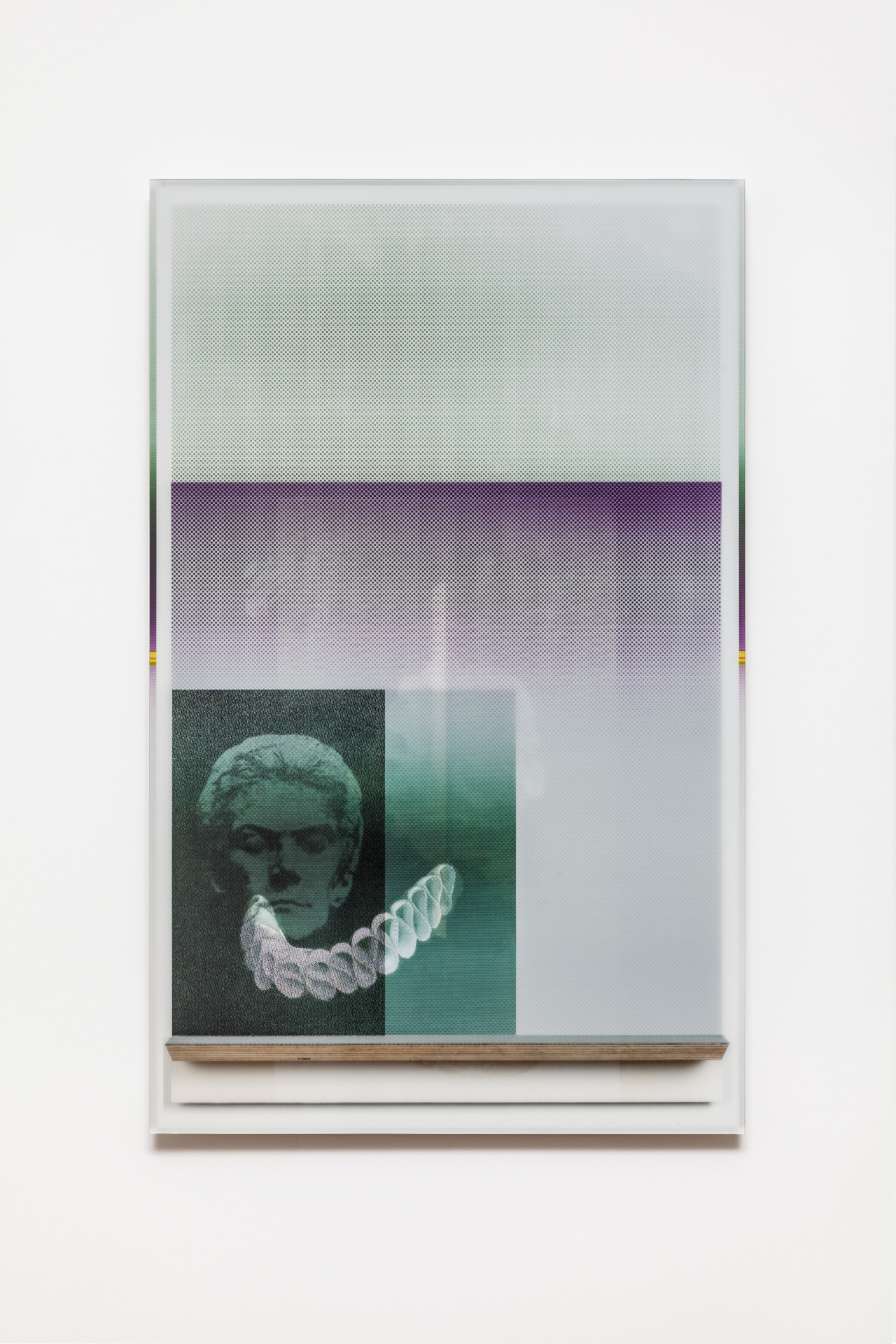 The image shows a print with overlayed images. A faint, plaid-printed grey covers the entire print. A smaller faint, purple plaid design overlays the grey on three-quarters of the image. On the bottom left is a printed green square with a white ribbon-like looped shape printed on top. A figure